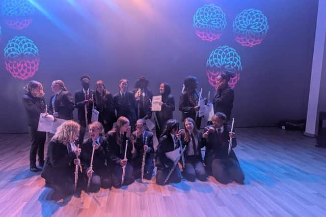 Pupils from seven Doncaster schools come together in song.
