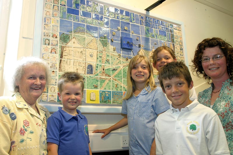 Beryl and Scott Hipwell, Harrry, Henry and Sarah Young with artist Caroline Chouler