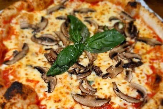 A pizza made by The Rustic Pizza Co.