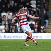 Doncaster Rovers are being tipped to face a play-off final date against AFC Wimbledon.