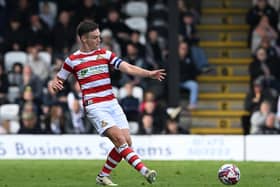Doncaster Rovers are being tipped to face a play-off final date against AFC Wimbledon.
