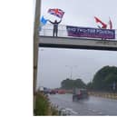 Drivers and residents shocked by banner by fascist neo-Nazi group Patriotic Alternative over A1(M) at Doncaster.