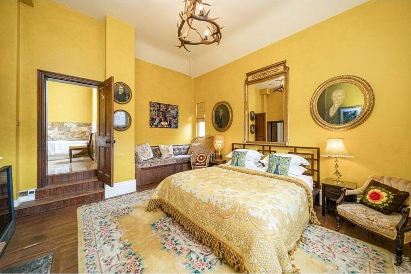 A golden theme for this beautiful bedroom.