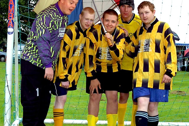A sports and fun day organised by various Lions Clubs was held at Sandall Park in 2008. Our picture shows members of the Thorne Lions and Thorne Warriors football teams, from left, Ian Coates, David Green, David Fretwell, Gavin Ridgill and John Green, sheltering from the rain before the soccer tournament got off to a wet start.