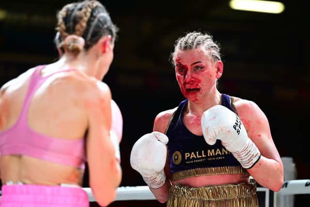 A bloodied Natalie Zimmerman.