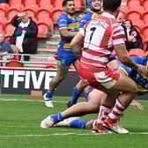 Pauli Pauli scores for the Dons in the defeat to Halifax. Picture via @Doncaster_RLFC