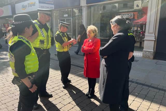 Doncaster Central MP Dame Rosie Winterton speaks to police officers in the town centre