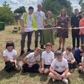 College and primary school students help build forest school