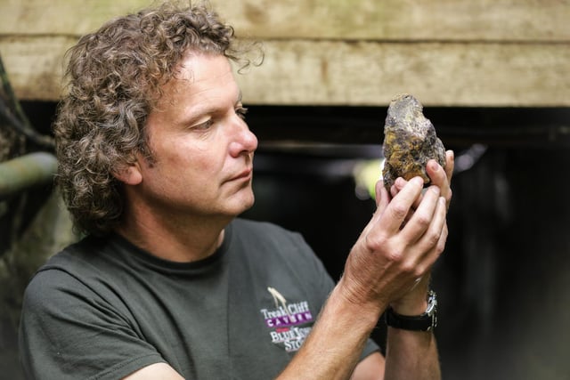 Gary Ridley at the entrance to Treak Cliff Cavern in Castleton in the Peak District with a new type of a rare semi-precious mineral that has been found for the first time in 150 years back in 2015