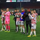 Doncaster Rovers' players celebrate after victory against Newport County.