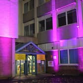 Entrance to the Women’s and Children’s Hospital illuminated purple
