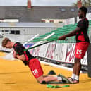 Doncaster Rovers' Bobby Faulkner completes a post-match warm down at Newport County.