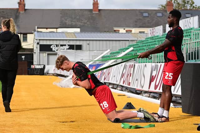 Doncaster Rovers' Bobby Faulkner completes a post-match warm down at Newport County.