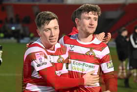 Harry Clifton (left) celebrates with teammate James Maxwell after Rovers saw off Harrogate.