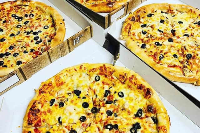 Takeaway pizzas from Pizzeria Milano.