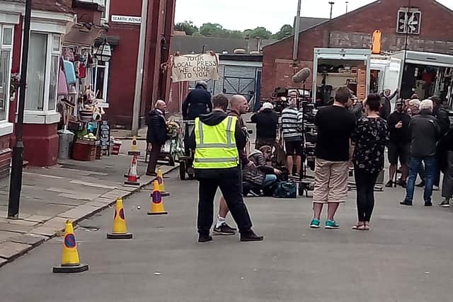 Film crews shooting Still Open All Hours at Lister Avenue, Doncaster, on June 3, 2019. Sir David Jason and Tim Healy are on the right of the shop.