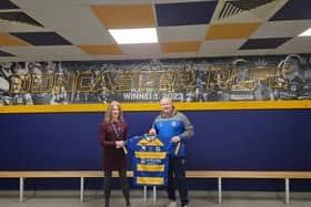 Cathy Hinde, DCLT Head of Marketing and Business Development with Carl Hall, Chief Executive of the Dons.