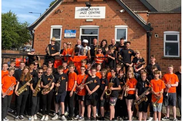 Nile Rodgers with members of Doncaster Youth Jazz Association. (Photo: DYJA).