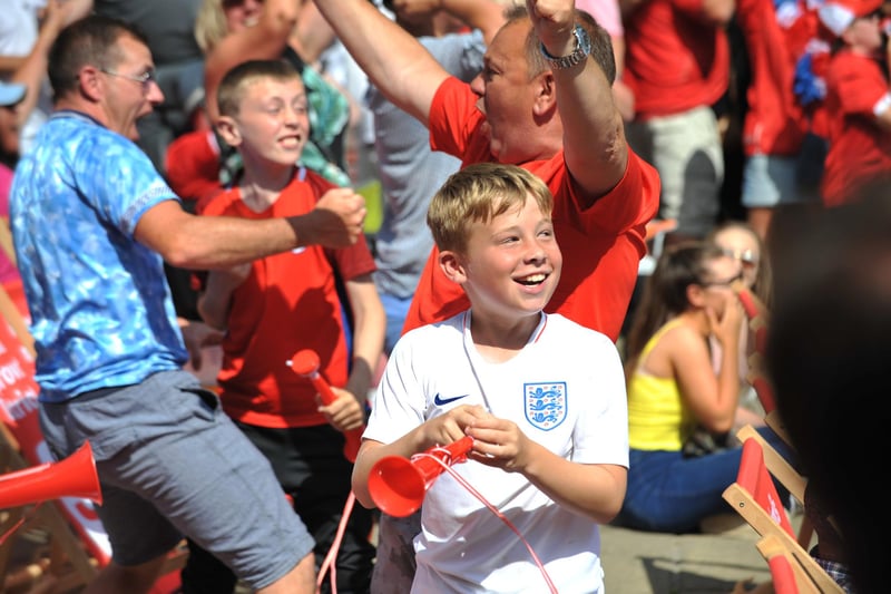 This time they did it! England fans celebrate at the Fanzone in Low Row as the team beats Sweden in 2018. Can you spot someone you know?