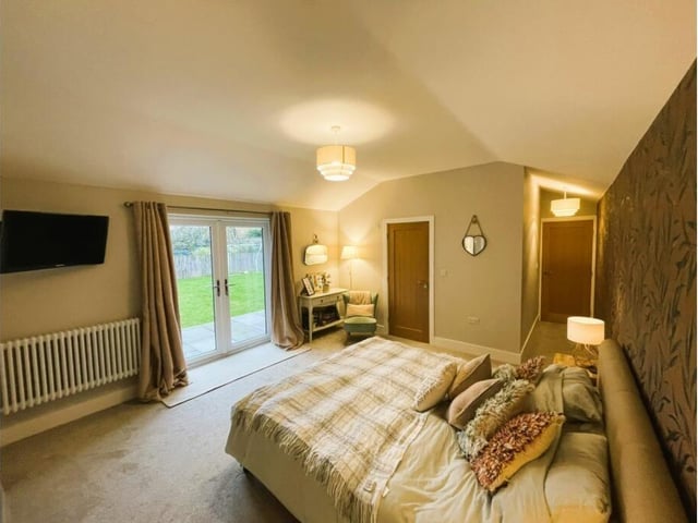 A double bedroom with French doors out to the garden.