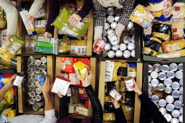 Volunteers sorting food at a foodbank