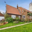 This unusual home has a rural setting and is for sale at £750,000.