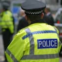 Police have cordoned off a road outside Conisbrough railway station