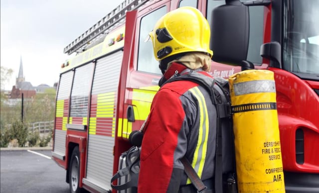 File picture showing a fireman and a fire engine