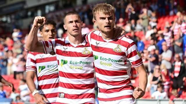 Doncaster Rovers are being given a 40% chance of victory at AFC Wimbledon.