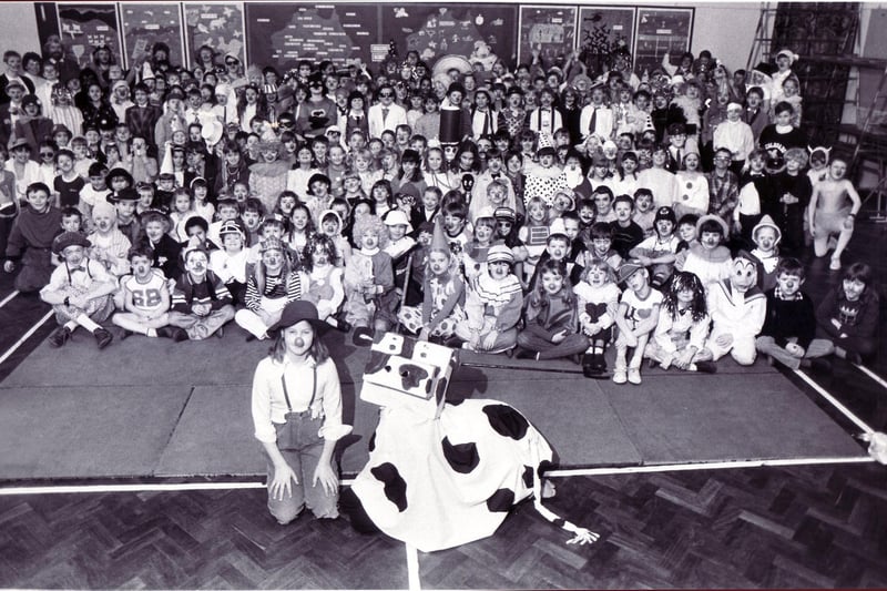 Dore School pupils show that they are really in the mood for laughs as they all line up in fancy dress for Comic Relief 1988