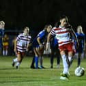 Doncaster Rovers Belles' Jess Andrew scores a penalty.