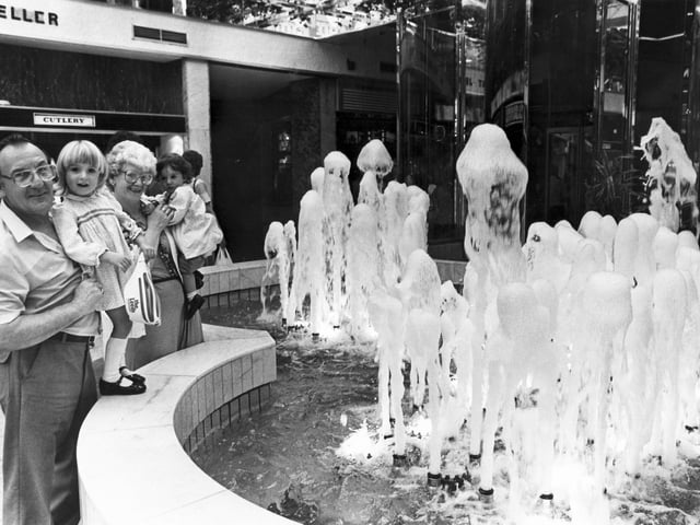 Admiring the fountain in the Doncaster Arndale Centre in 1985