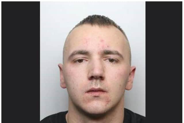 Police are hunting wanted man Jake Elliott.