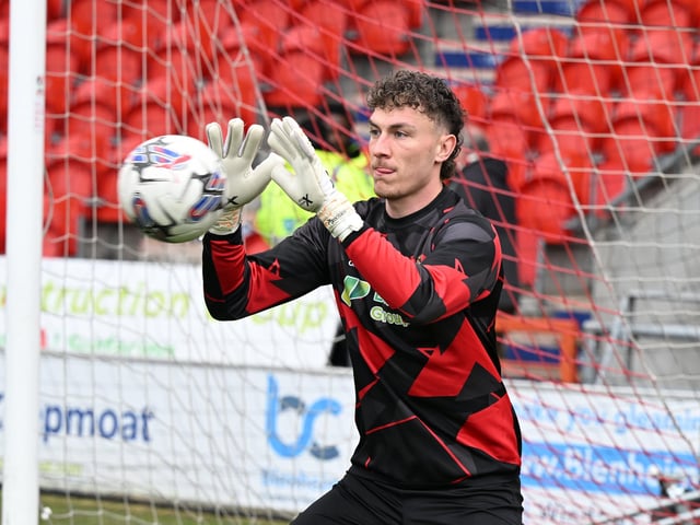 Thrown into the thick of it after red card. Conceded straight away but made amends with fine, late save.