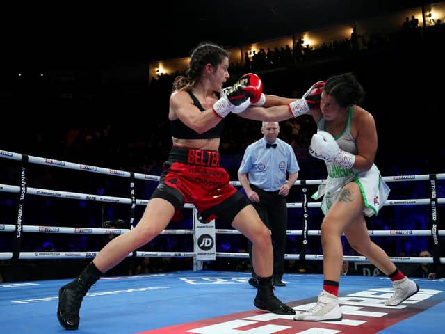 Terri Harper (red gloves) punches Yamila Belen Abellaneda (white gloves) during WBA Inter-Continental Female Lightweight Title fight between Terri Harper and Yamila Belen Abellaneda at Motorpoint Arena Nottingham on March 12, 2022 in Nottingham, England. (Photo by Nigel Roddis/Getty Images)