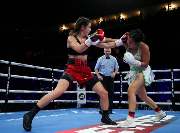 Terri Harper (red gloves) punches Yamila Belen Abellaneda (white gloves) during WBA Inter-Continental Female Lightweight Title fight between Terri Harper and Yamila Belen Abellaneda at Motorpoint Arena Nottingham on March 12, 2022 in Nottingham, England. (Photo by Nigel Roddis/Getty Images)