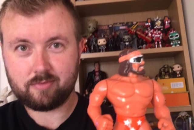 Nathan Gale with his Randy Savage figure.
