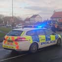 Police at the scene of the collision in Wadworth.
