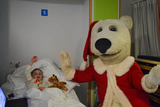 Victor the Polar bear spreads festive cheer at Doncaster Royal Infirmary Children’s Ward.