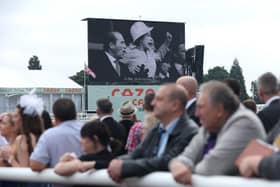 A general view as an LED board inside Doncaster Racecourse displays a tribute to Her Majesty Queen Elizabeth II. Photo: Eddie Keogh/Getty Images