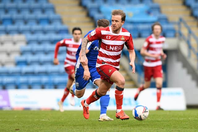 James Coppinger in action against Gillingham at the weekend when he scored one and assisted another goal in the 2-2 draw. Picture: Howard Roe/AHPIX