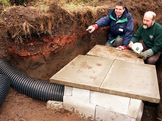 Dr Robert Forrester (right) and Miles Foulger, of Yorkshire Water, examine the Otter halt at the water treatment works at Burcroft Hill, Conisbrough, March 1999