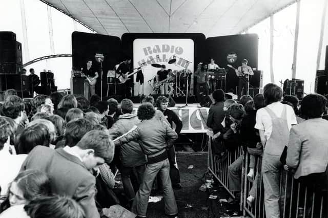 UB40 performing at a Radio Hallam Roadshow in the early 1980s - some fascinating fashions on display in the crowd! Ref no U05987