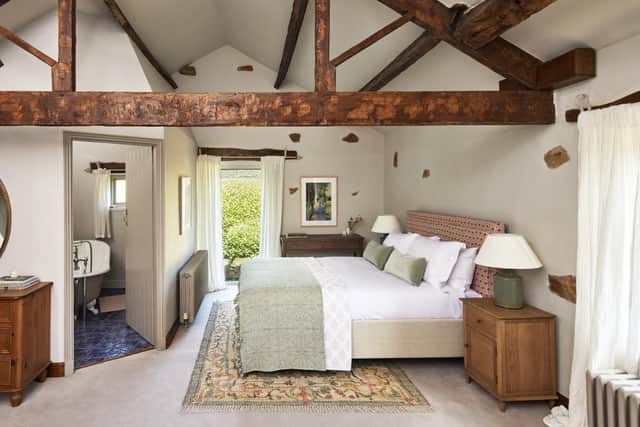 A beamed bedroom in the Granary guest cottage that comes with the farmhouse.