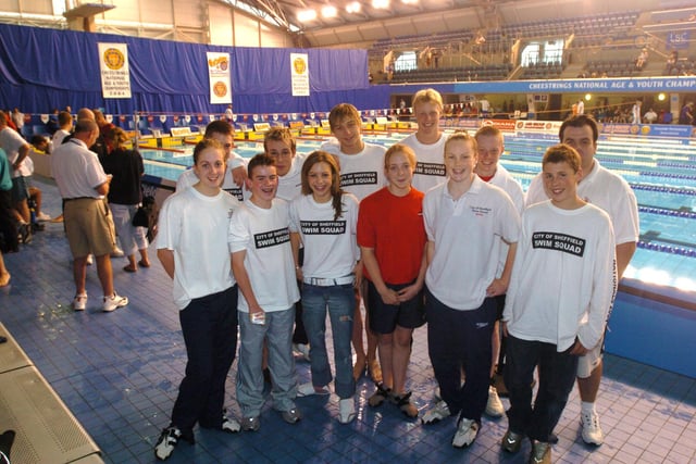Seen at poolside are members of the City of Sheffield Swimming squad, with their coach Russ Barber in 2004