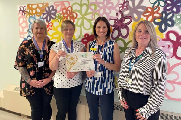 The Health and Wellbeing team at DBTH with Chief People Officer, Zoe Lintin (second right)