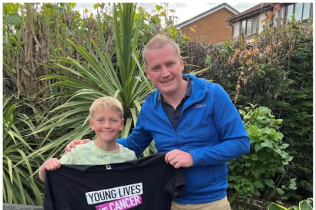 Adrian Fowler and son Joshua as well as the family's pet Alsatian will be taking on Hadrian's Wall for cancer charities.