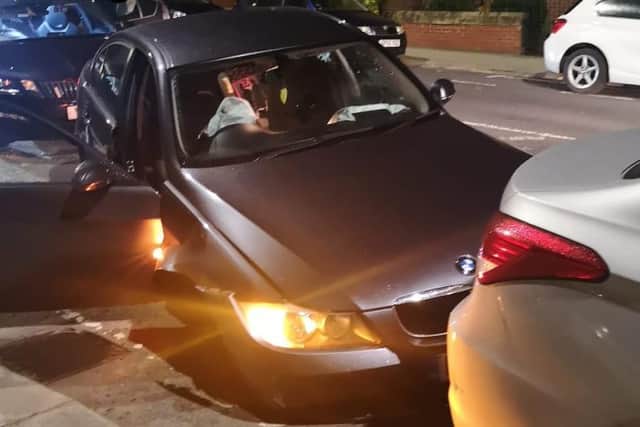 The car collided with a parked car.