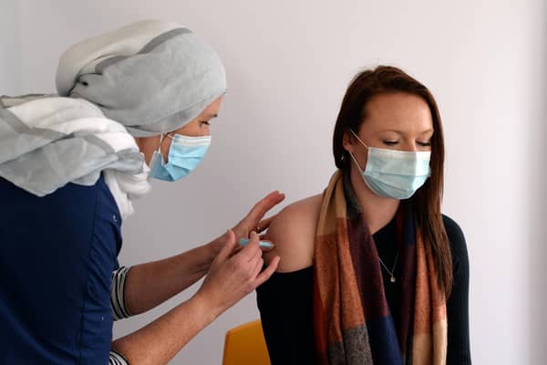 Emma Smith, Nurse Practitioner, pictured administering first dose vaccinations at Jamia Mosque pop-up clinic in Hyde Park last month
