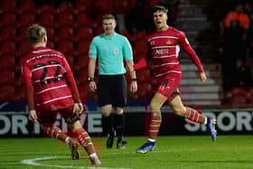 Branden Horton celebrates scoring against Oxford United.